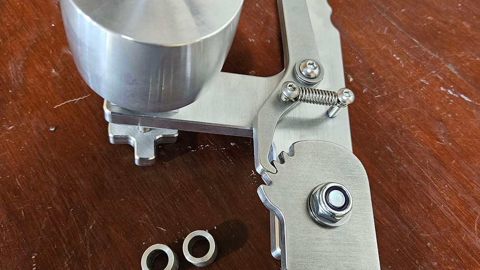 Rachet style belt tensioner with tracking wheel.  