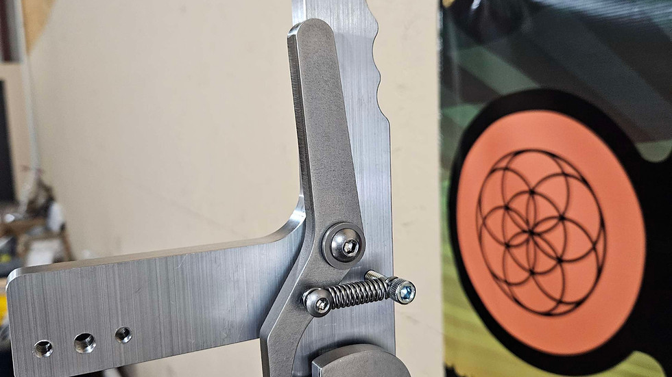 Rachet style belt tensioner with tracking wheel.  